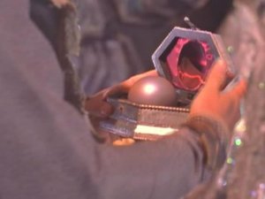 A smaller orb device in a case